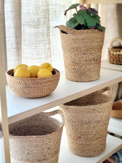 A multifunctional basket set! These handwoven baskets are perfect planters or storage for blankets, magazines, and everything more.